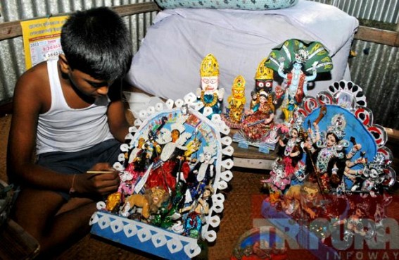 13 years old child prepares an Idol of Goddess Durga at Pratapgarh